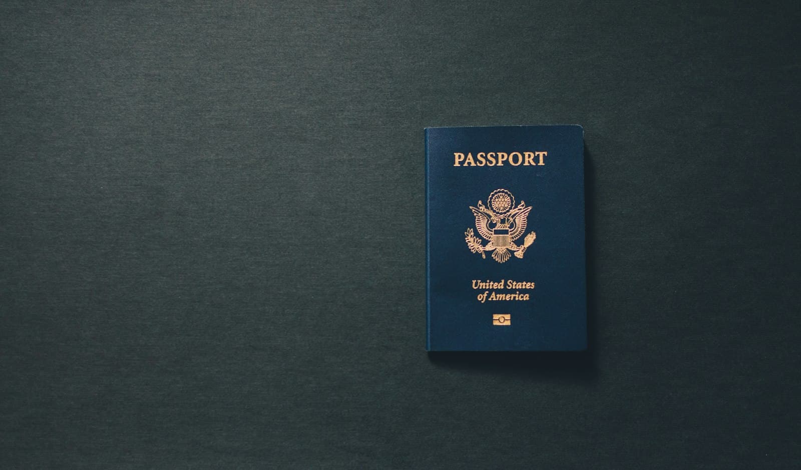 United States passport on a dark surface